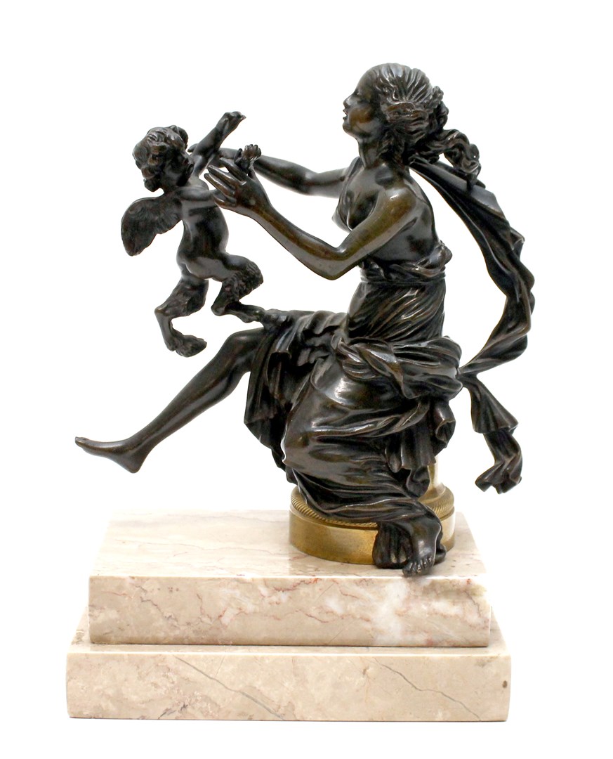 Appraisal: A French bronze group of a Bacchante and an infant