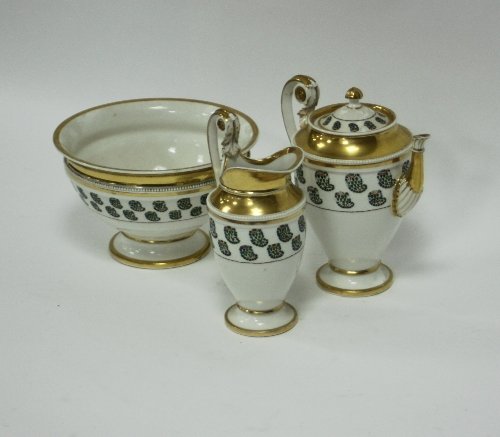 Appraisal: A Paris porcelain teaset comprising teapot milk jug and slop