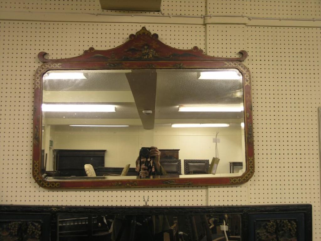 Appraisal: A Chinese red lacquered mirror rectangular-shape gilded with chinoiseries bevelled