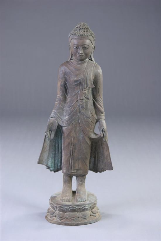 Appraisal: BURMESE BRONZE FIGURE OF BUDDHA Mandalay period Standing on lotus