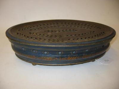 Appraisal: A REGENCY TOLEWARE DISH of oval form with pierced liner