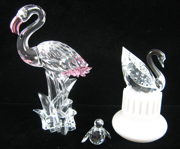 Appraisal: THREE SWAROVSKI AUSTRIAN CUT CRYSTAL BIRDS Centenary Swan H with