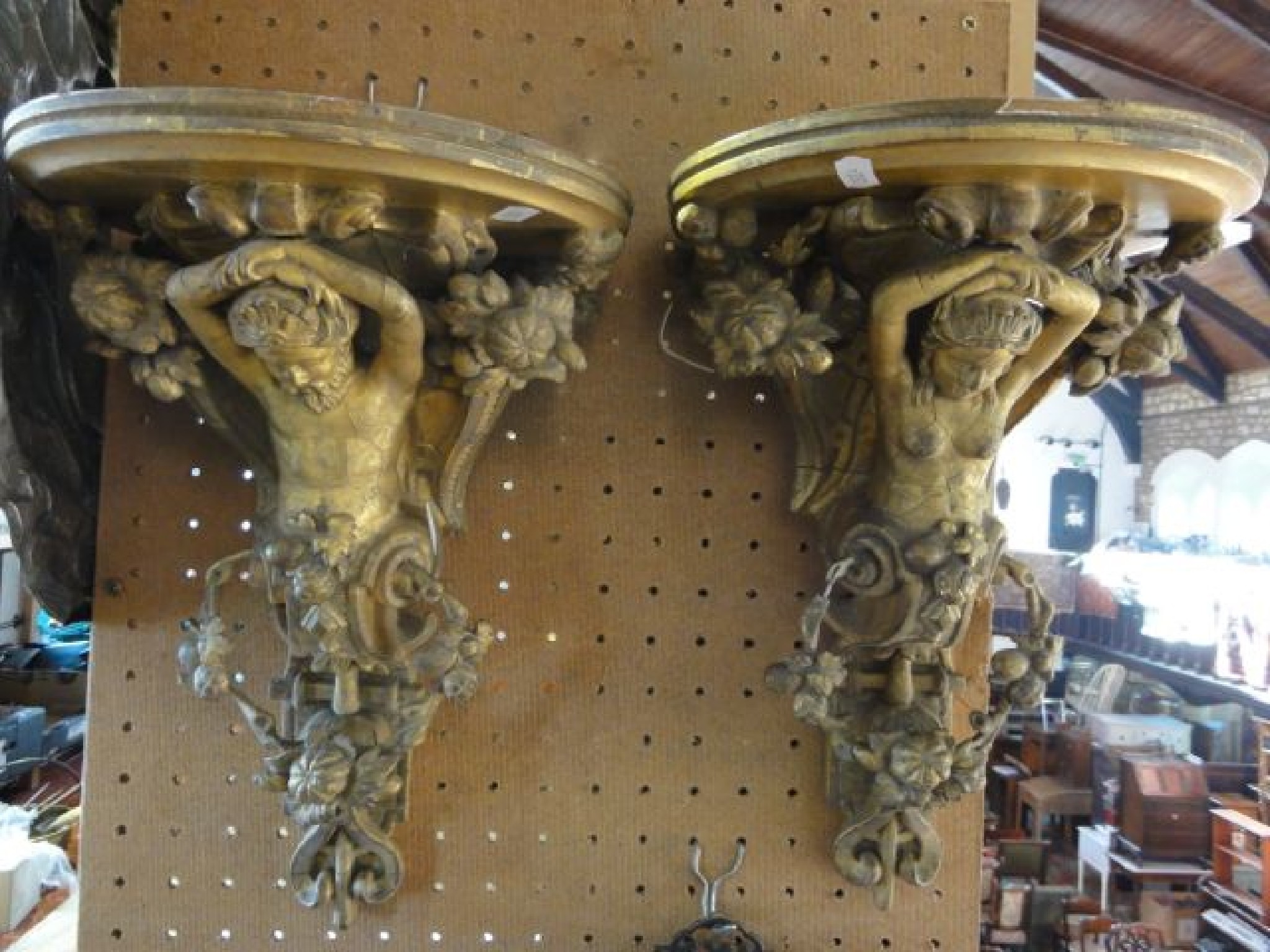 Appraisal: A good quality pair of th century carved and gilded