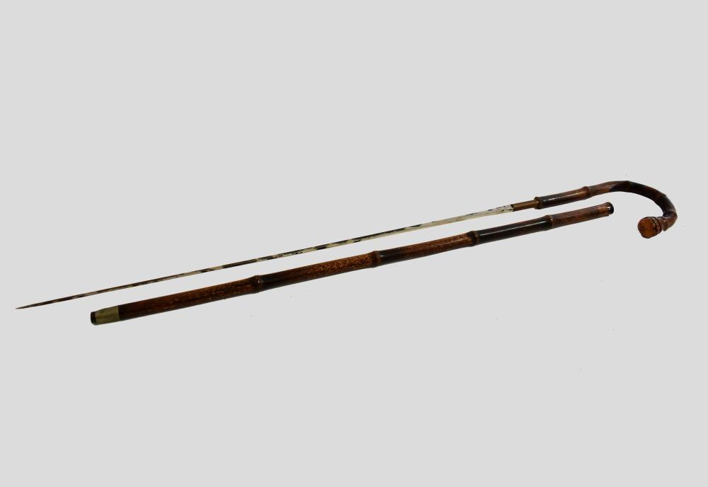 Appraisal: METAMORPHIC BAMBOO SWORD CANE th Early th Century The crook