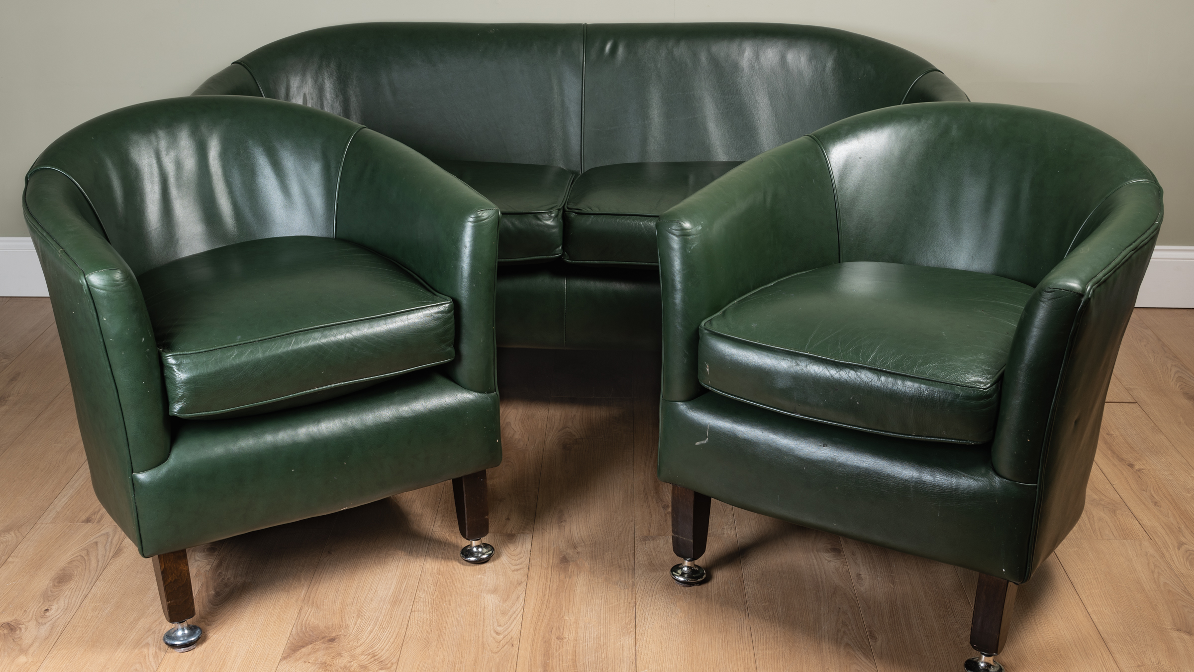 Appraisal: A contemporary green leather three piece suite consisting of a