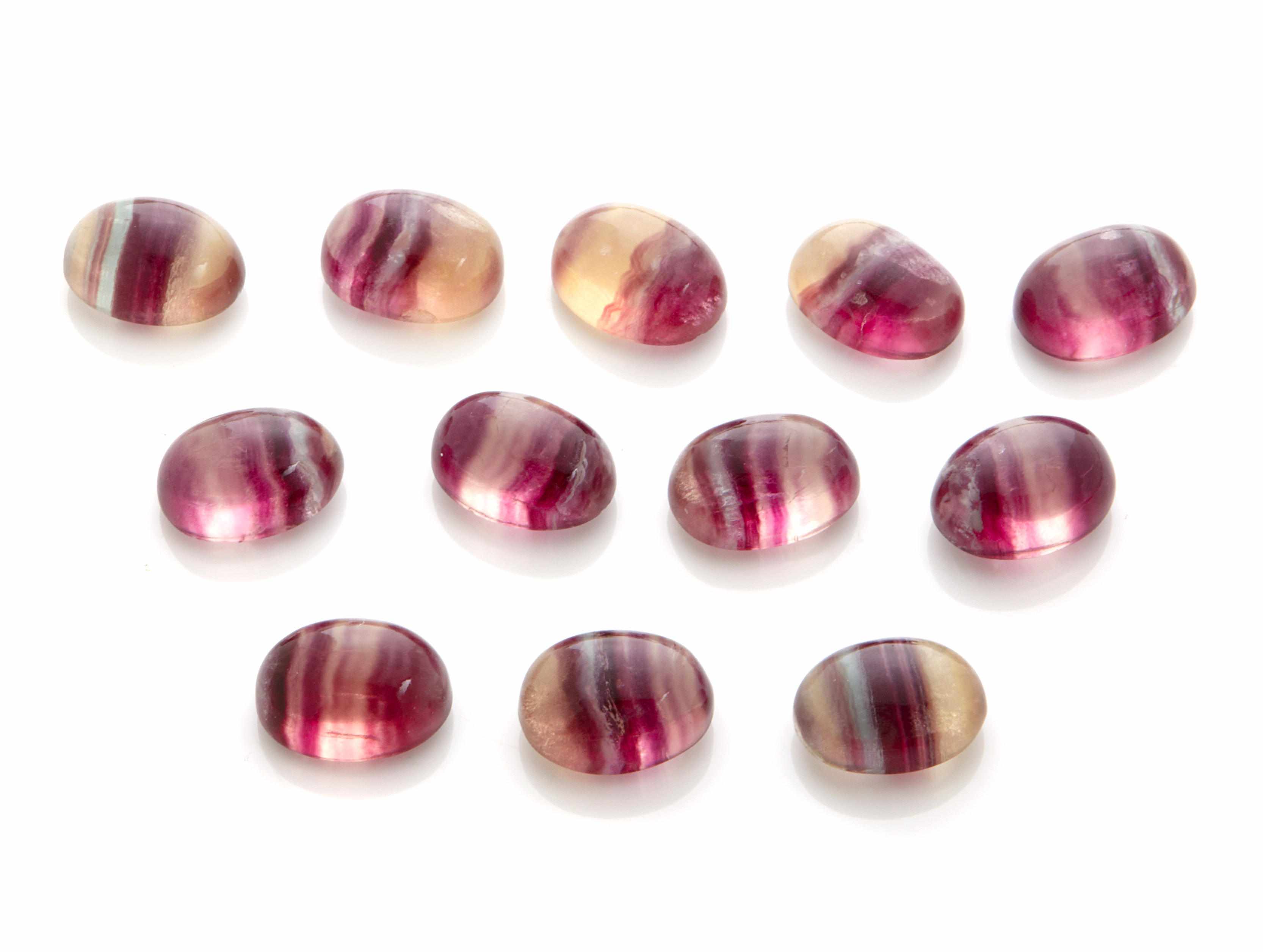 Appraisal: Group of Fluorite Cabochons Argentina Twelve oval cabochon fluorites showing