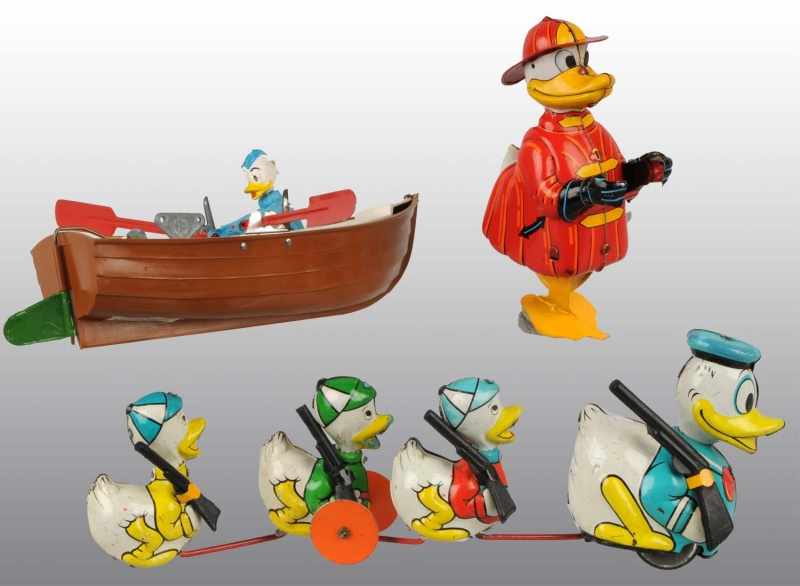 Appraisal: Lot of Walt Disney Donald Duck Wind-Up Toys Description Includes