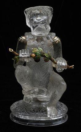 Appraisal: CONTINENTAL ENAMEL-MOUNTED CARVED ROCK CRYSTAL FIGURE OF A MONKEY Modeled