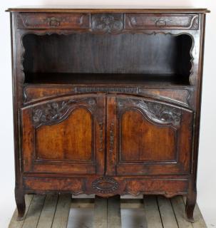 Appraisal: French Provincial carved walnut cabinet with niche h x w