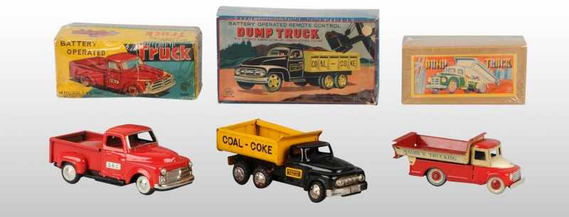 Appraisal: Lot of Tin Litho Pickup Dump Truck Toys Description Japanese