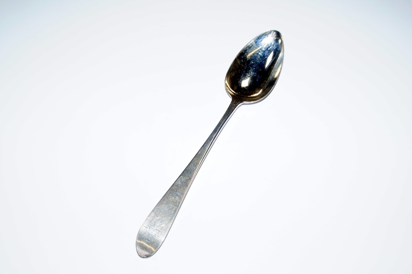 Appraisal: A George III Irish silver tablespoon decorated in the Old