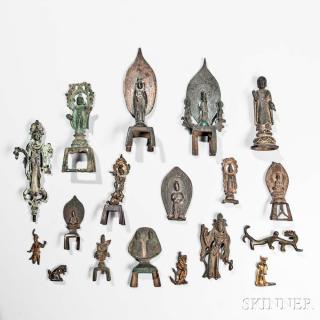 Appraisal: Eighteen Mostly Buddhist Archaic Gilt-bronze and Bronze Miniature Items Eighteen