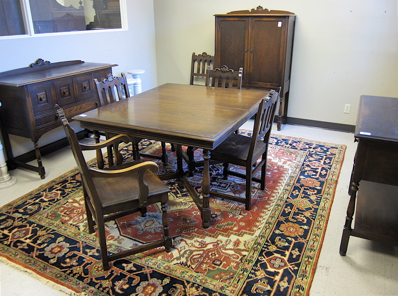 Appraisal: NINE-PIECE OAK DINING FURNITURE SET Northern Furniture Co Sheboygan Wisconsin