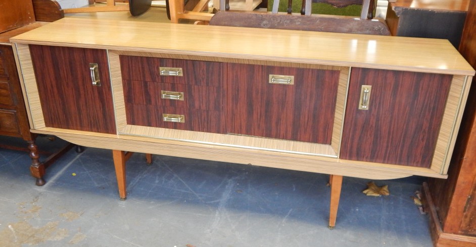 Appraisal: A Retro style melamine and walnut veneered sideboard of low