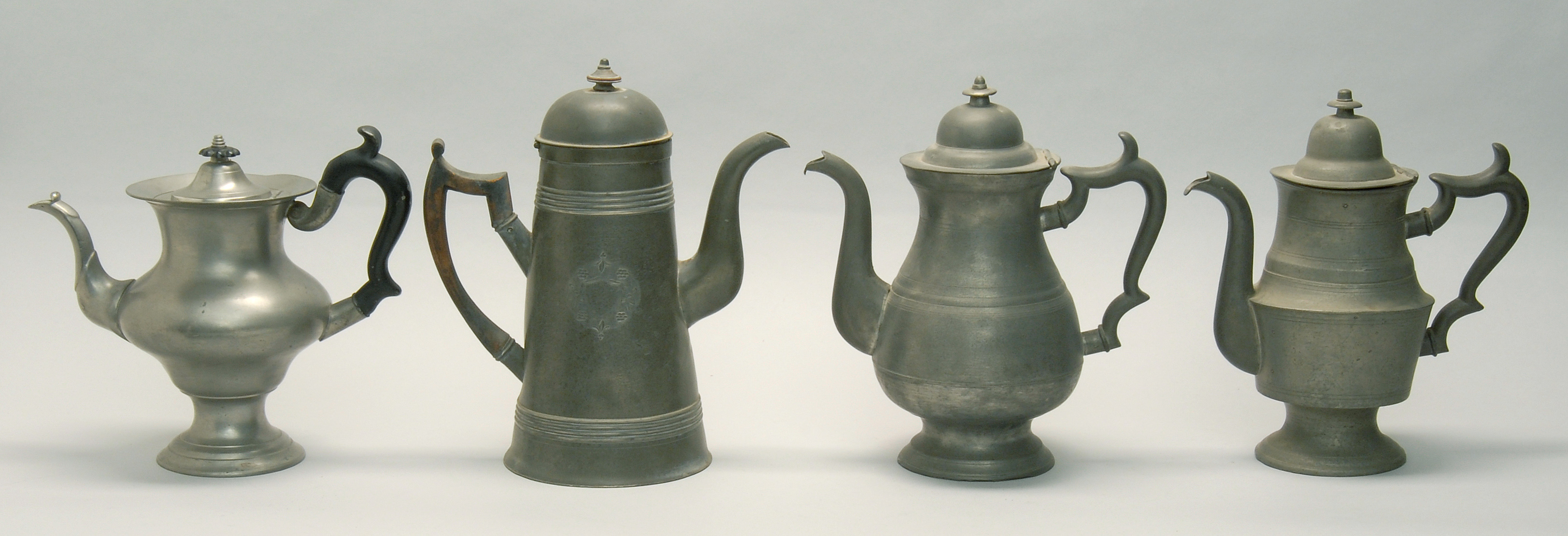 Appraisal: FOUR AMERICAN PEWTER COFFEEPOTS First Half of the th Century