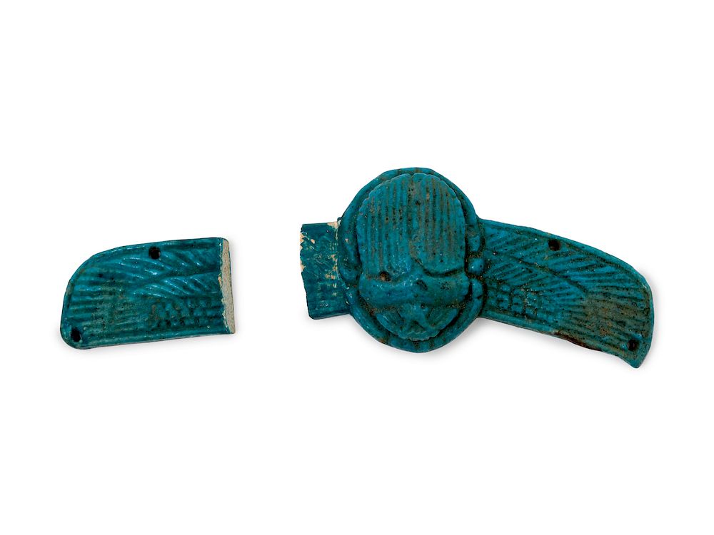 Appraisal: An Egyptian Faience Winged Scarab An Egyptian Faience Winged Scarab