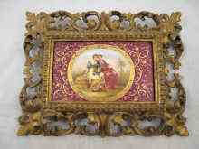 Appraisal: A rectangular porcelain plaque of a romantic scene in gilt