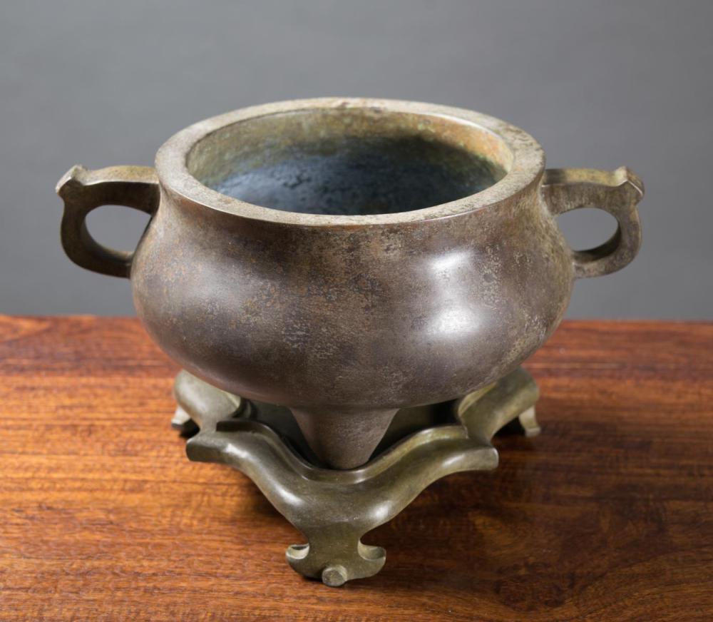 Appraisal: CHINESE BRONZE FOOTED CENSER ON PLINTH attributed Qing Dynasty -