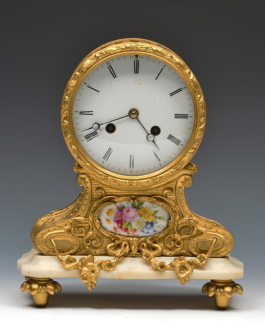 Appraisal: A th Century French drum head mantel clockwith white enamel