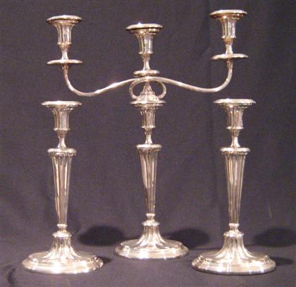 Appraisal: Sheffield plate three peice garniture th century Comprising a candelabra