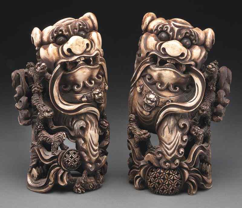 Appraisal: Pr Chinese carved ivory foo dogs International buyers should note