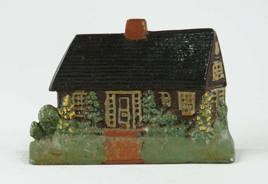 Appraisal: ANTIQUE HOUSE DOORSTOP Colonial form with black roof and red