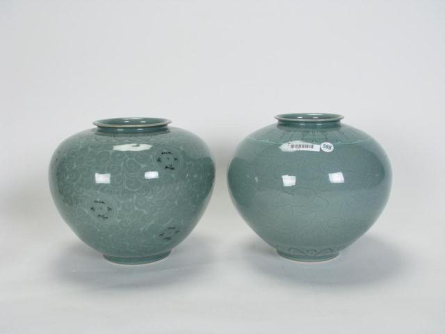 Appraisal: Two Chinese Decorator Celadon Vases both are '' high