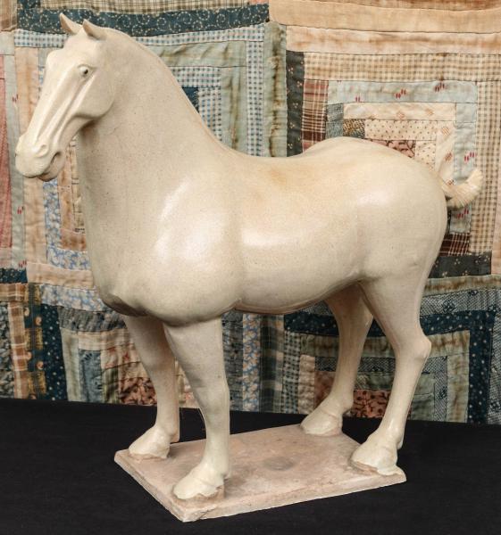 Appraisal: A TH CENTURY CERAMIC TANG STYLE HORSEThe decorative item as