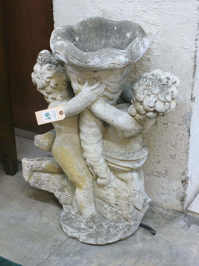 Appraisal: FIGURAL CONCRETE GARDEN FOUNTAIN with cornucopia fountain bowl embraced between