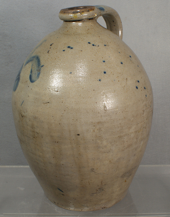 Appraisal: Blue decorated stoneware ovoid jug hairline in handle tall Estimate