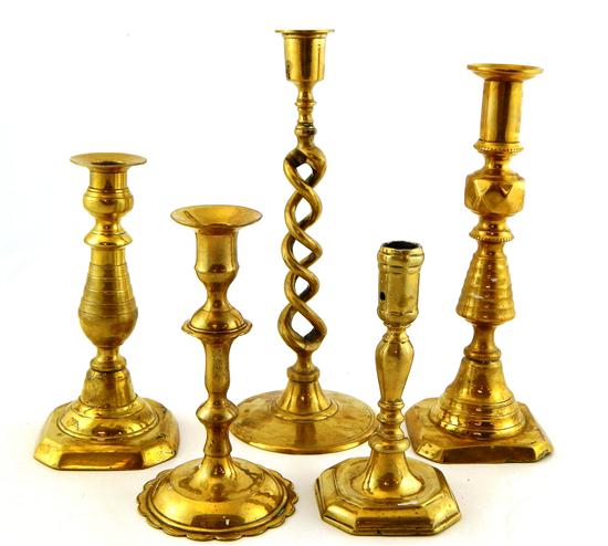 Appraisal: Five brass candlesticks two early Continental brass candlesticks unmarked taller