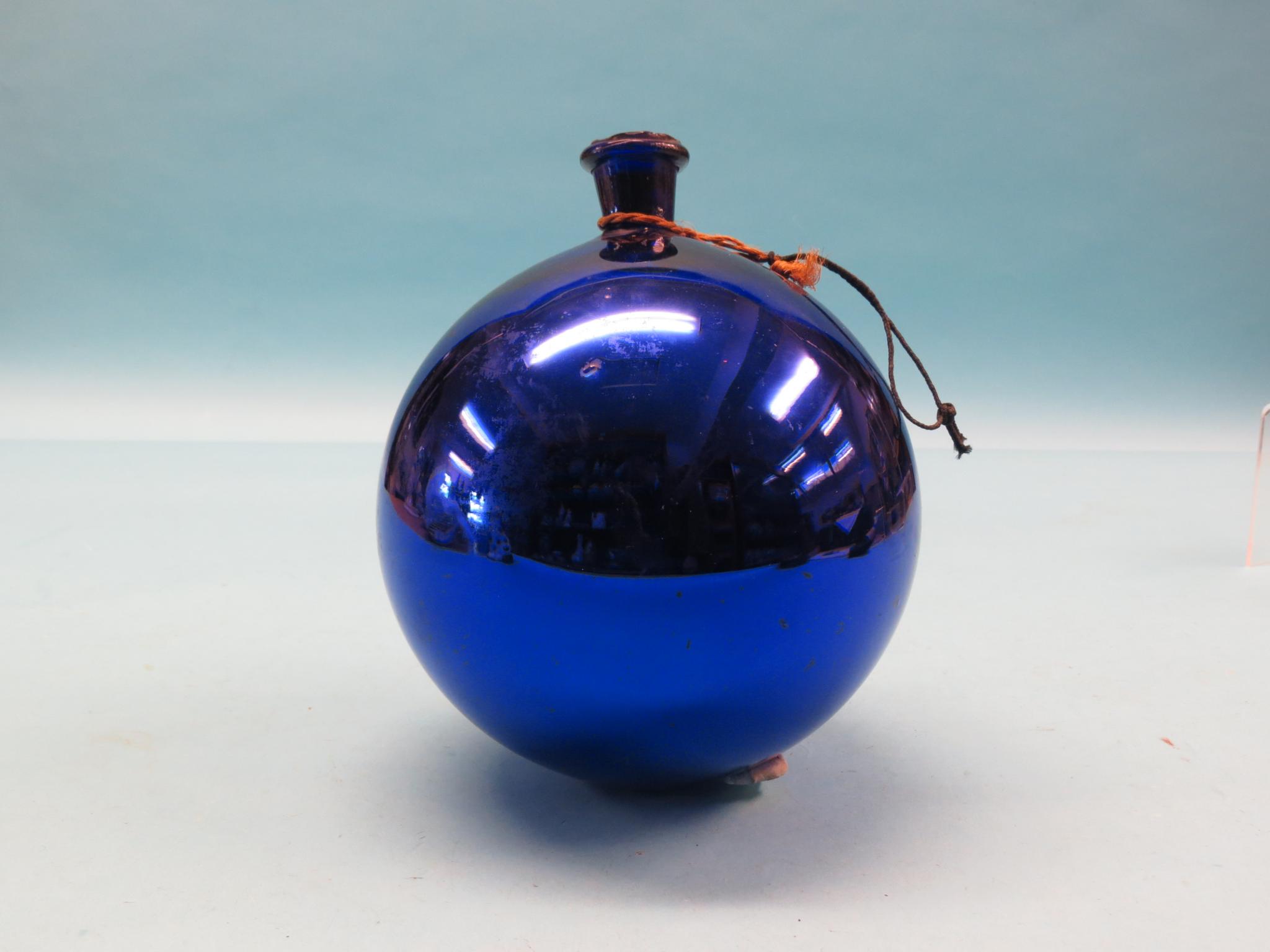 Appraisal: A witch's ball deep blue in diameter