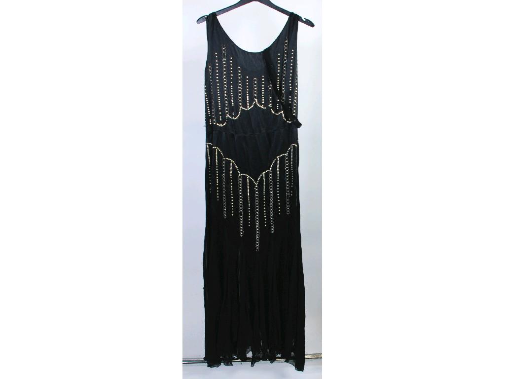 Appraisal: BLACK SATIN FLAPPER DRESS sleeveless with paste jewelled decoration and