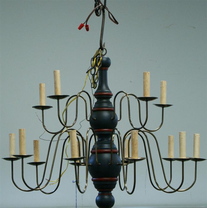 Appraisal: Colonial style painted wood and brass tone multi arm chandelier