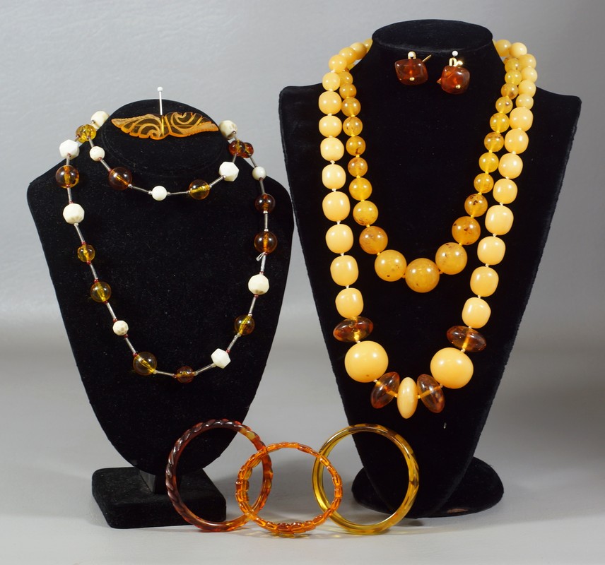 Appraisal: butterscotch amber necklaces amber and white bead necklace amber color