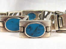 Appraisal: A silver and turquoise bracelet