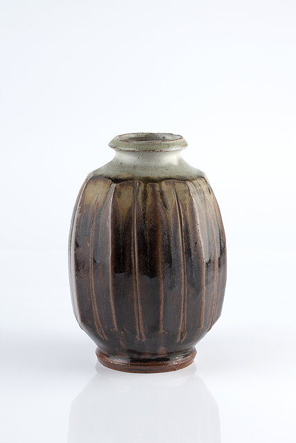 Appraisal: Mike Dodd British b Vaseash and tenmoku glaze and facetted