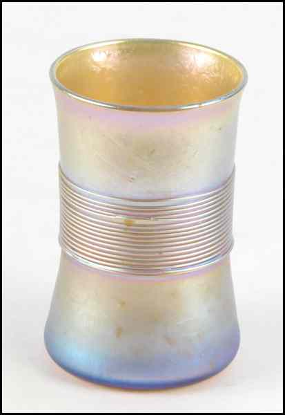 Appraisal: TIFFANY FAVRILE GLASS CUP Bearing glass threading along the middle