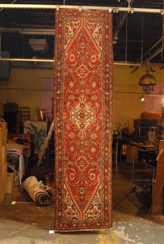 Appraisal: DECORATIVE ORIENTAL RUNNER ' x ' Red and white pattern