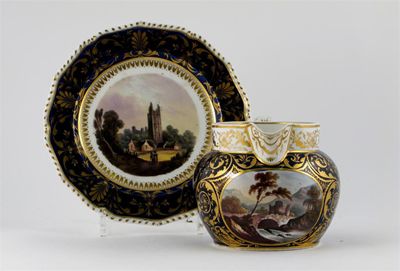 Appraisal: A Derby jug and plate painted with scenes of castles