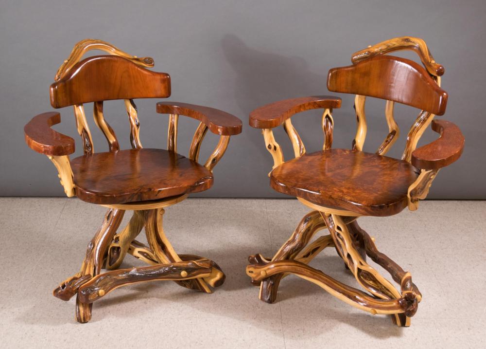 Appraisal: PAIR OF ARTISAN STUDIO SWIVEL CAPTAIN'S CHAIRS manzanita wood tripod