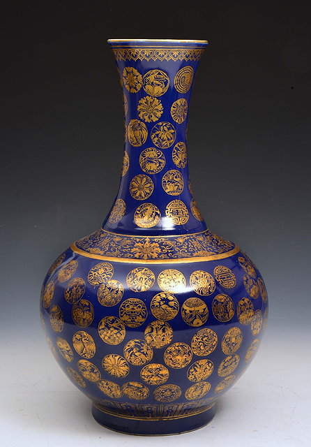 Appraisal: A CHINESE BLUE AND GOLD 'MEDALLION' BOTTLE VASE decorated in