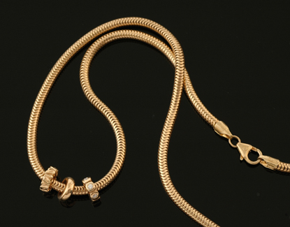 Appraisal: A gold necklace with Pandora charms The ct gold snake