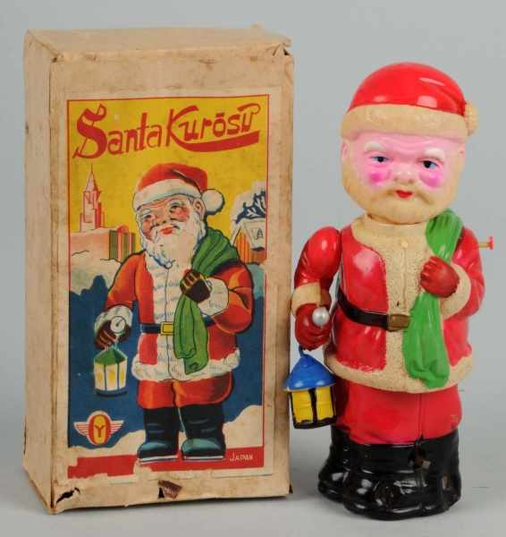 Appraisal: Celluloid Santa Wind-Up Toy Description Japanese When wound Santa moves