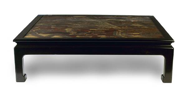 Appraisal: A wood coffee table with a top made from fragments