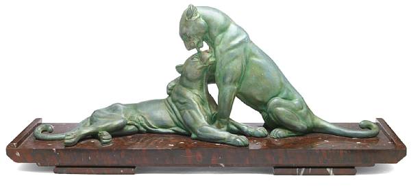 Appraisal: An Art Deco patinated-metal and marble study of two lionesses