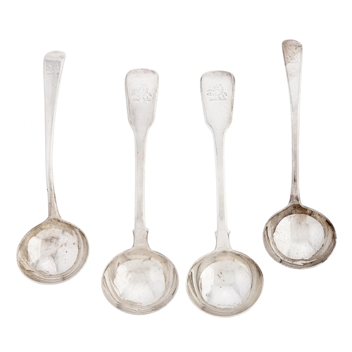 Appraisal: A pair of George III silver sauce ladles Old English