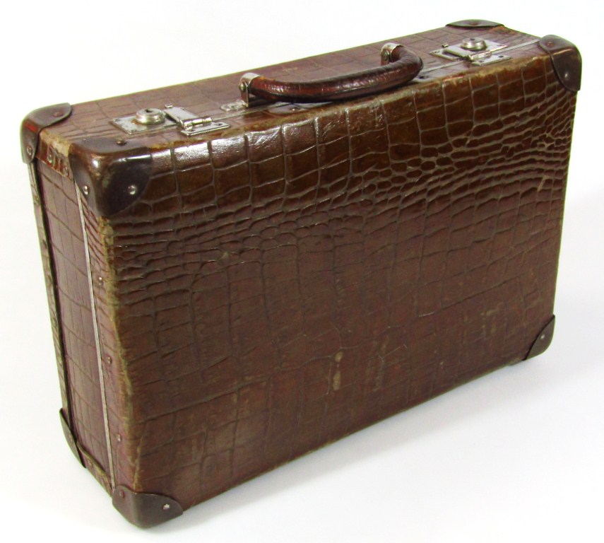 Appraisal: A thC faux crocodile skin leather suitcase with chrome mounts