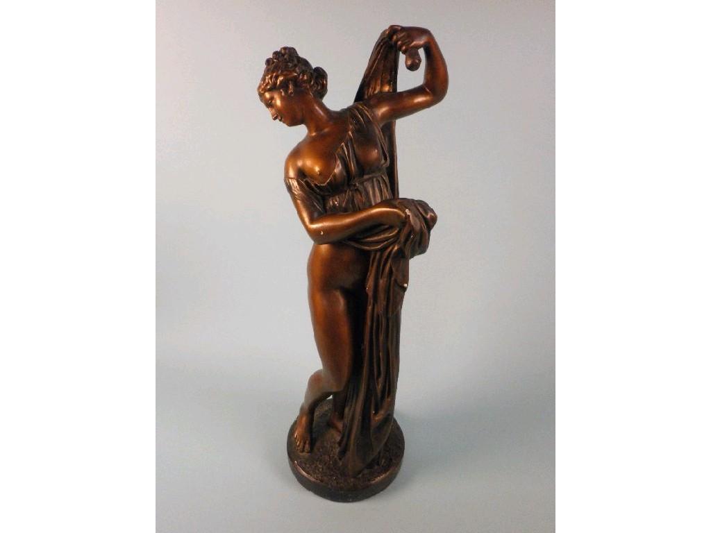 Appraisal: A bronzed plaster figure of a scantily clad maiden on