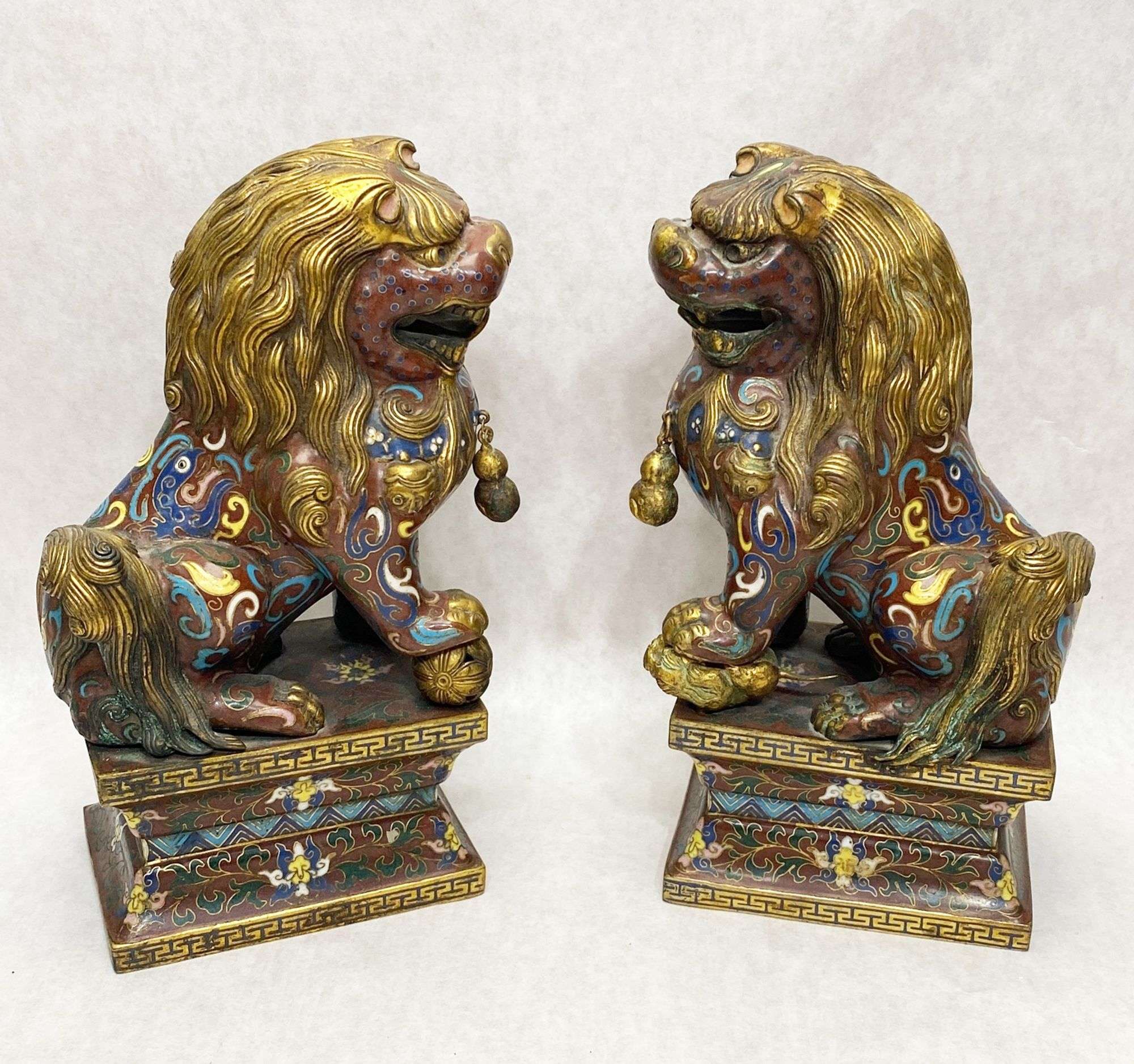 Appraisal: Pair Chinese Cloisonne Foo Lion Figures tall late th or